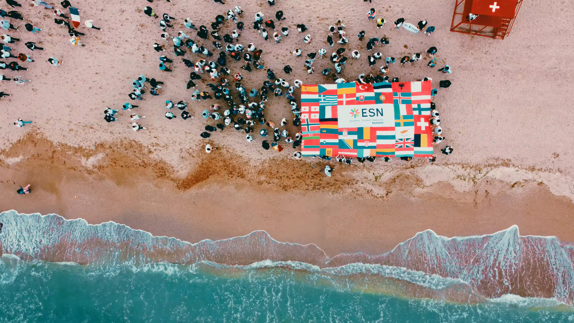 Large ESN flag on the beach seen from above