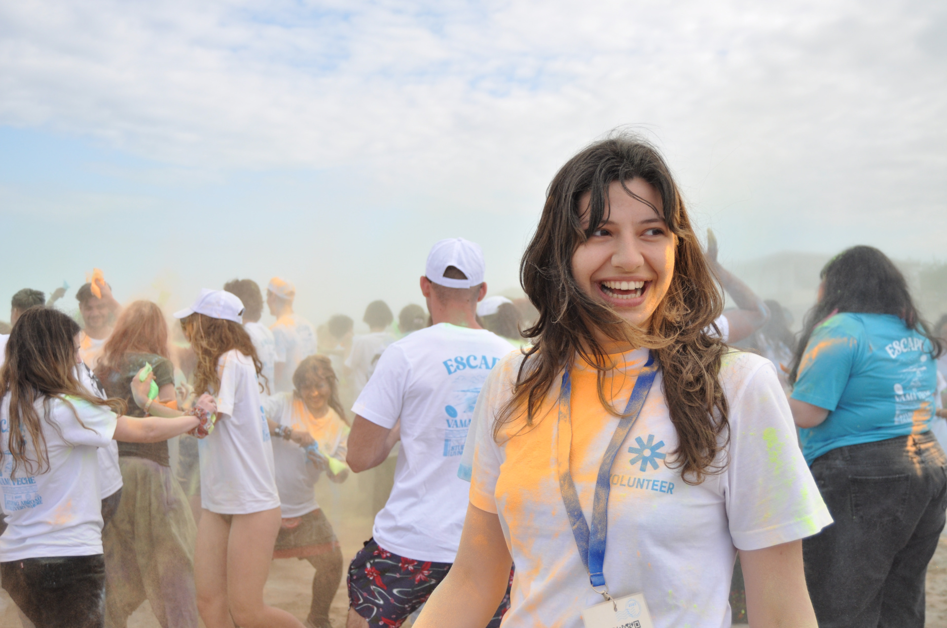 Woman covered in dye during colourful activity